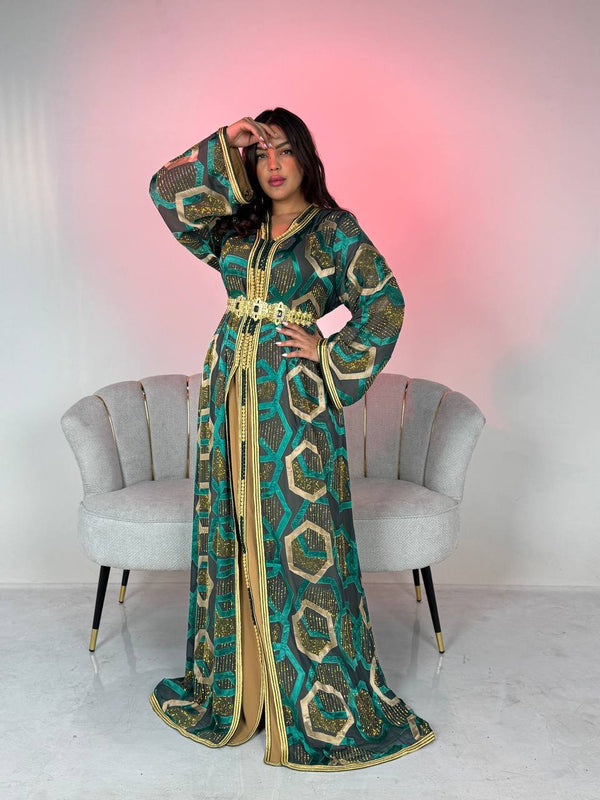 A luxurious Moroccan takchita with hand embroidery—royal elegance with modern details.