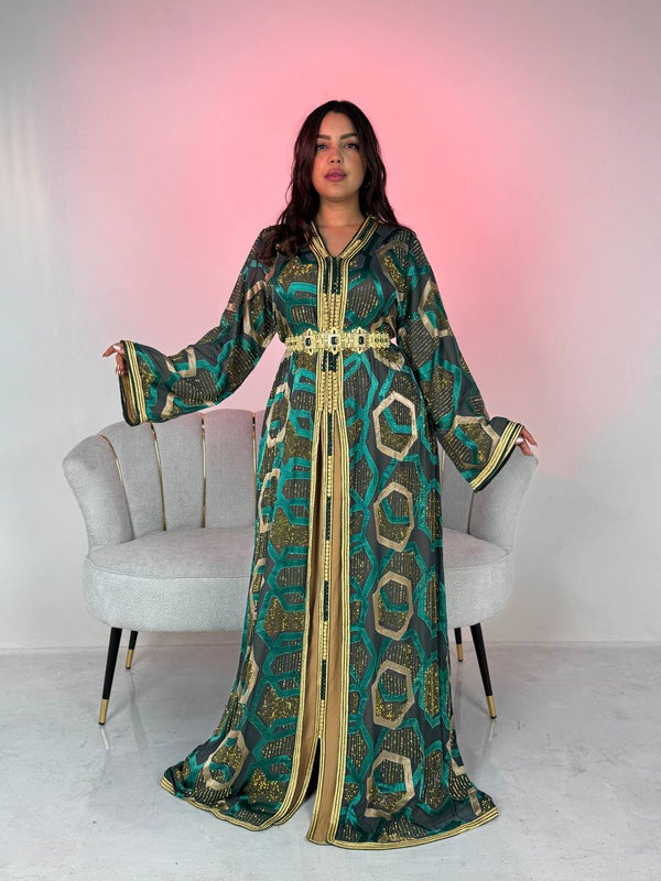 A luxurious Moroccan takchita with hand embroidery—royal elegance with modern details.